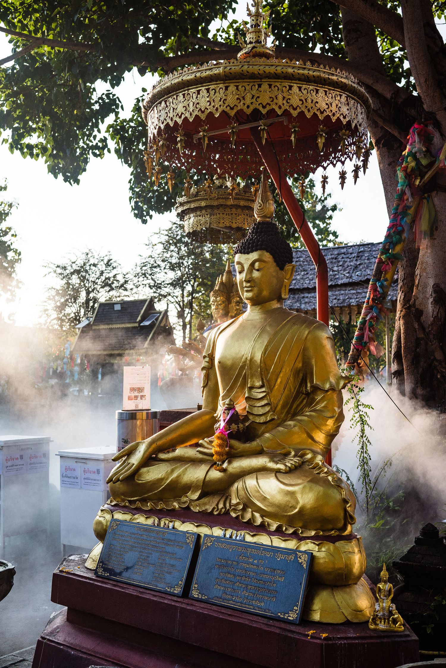 A golden Buddha statue. Best Time to Visit Chiang Mai, Thailand. Weather and temperature of the seasons.