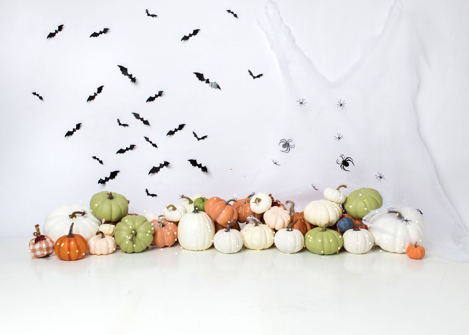Halloween Fall pumpkin first birthday cake smash setup with neutral seasonal decor in Linden, New Jersey.