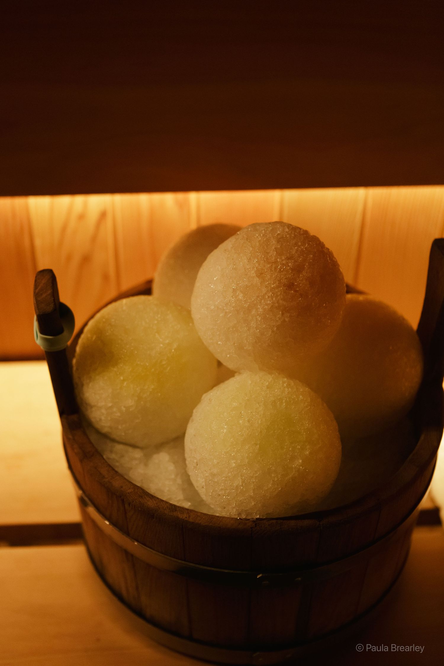 Minimalist spa lounge area with tea station at Othership Flatiron in Manhattan