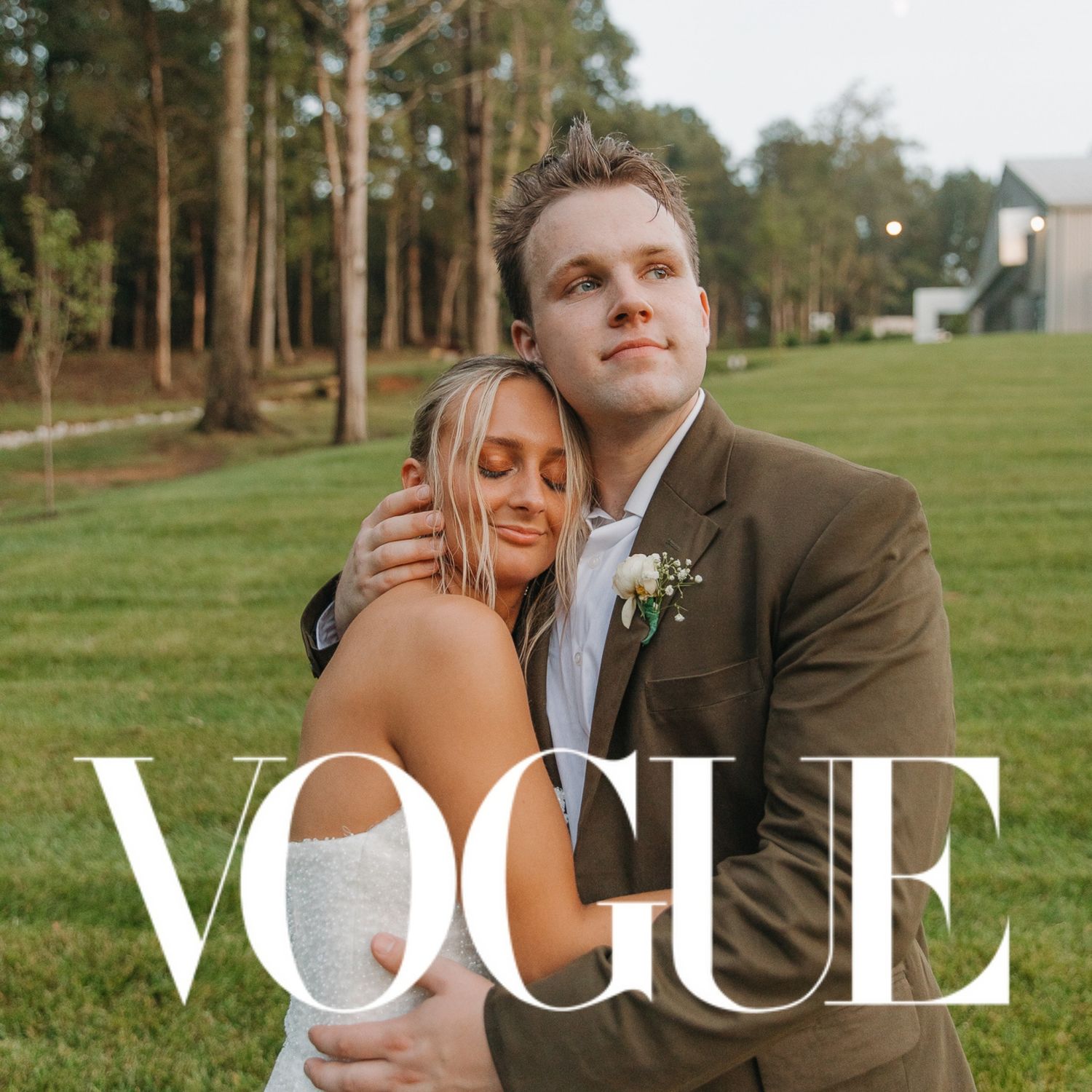 A romantic outdoor wedding portrait features a couple embracing on a grassy lawn with pine trees in the background.