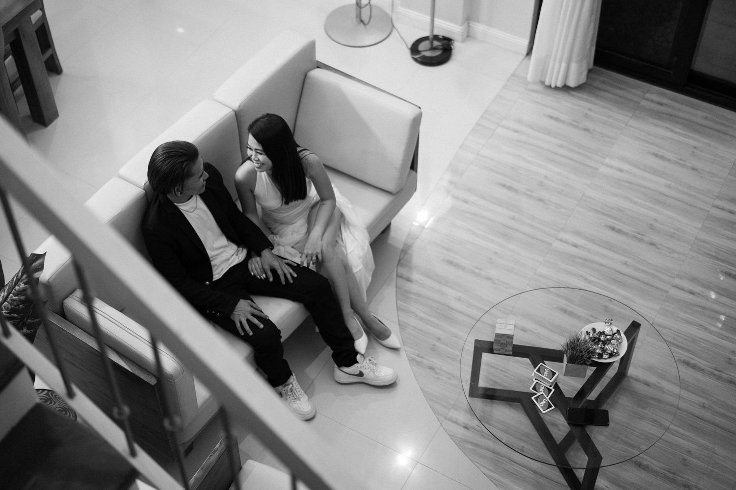 Series of wedding photos showing couple in a dance studio with wooden floors.