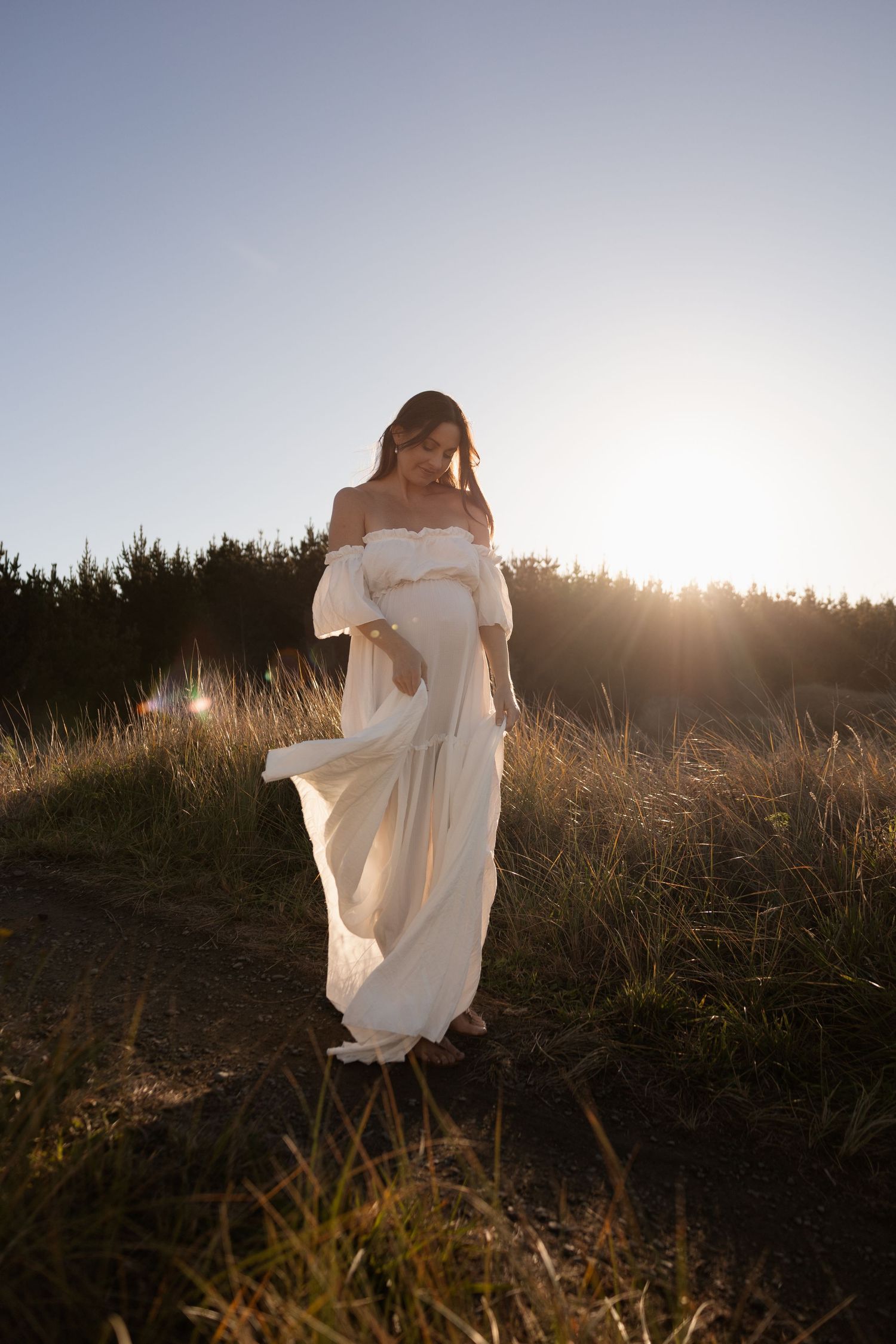 Solo sunset maternity session at Waimari beach, christchurch