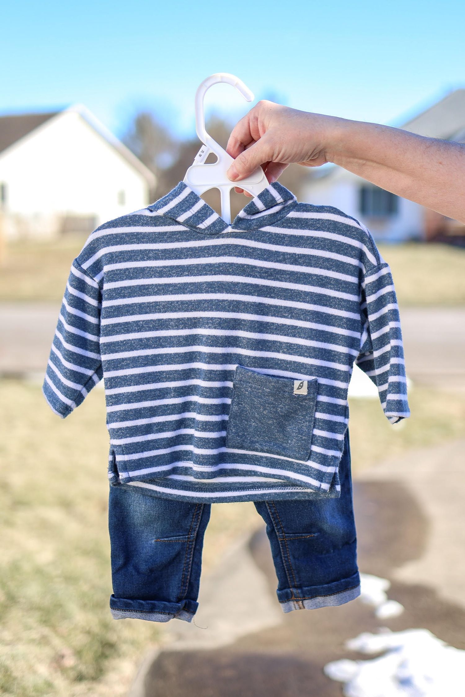 Central IL family photographer's client closet features a blue and white stripped hoodie