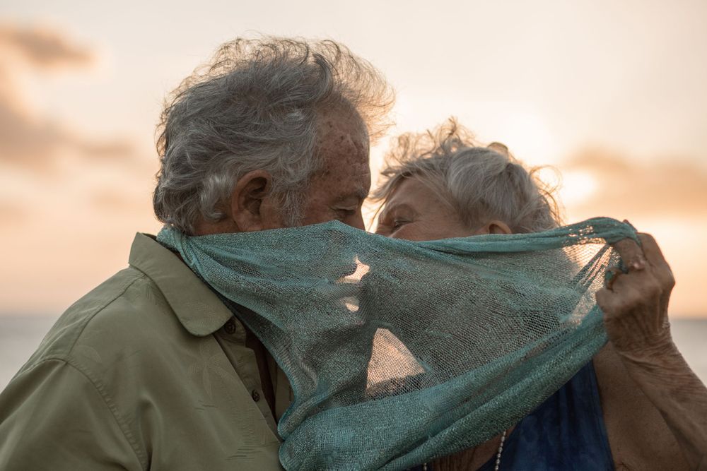 senior couple kissing on Maui