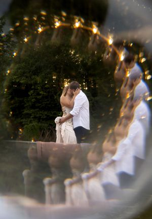 Dreamy bokeh effect photo of a romantic boat scene at golden hour.