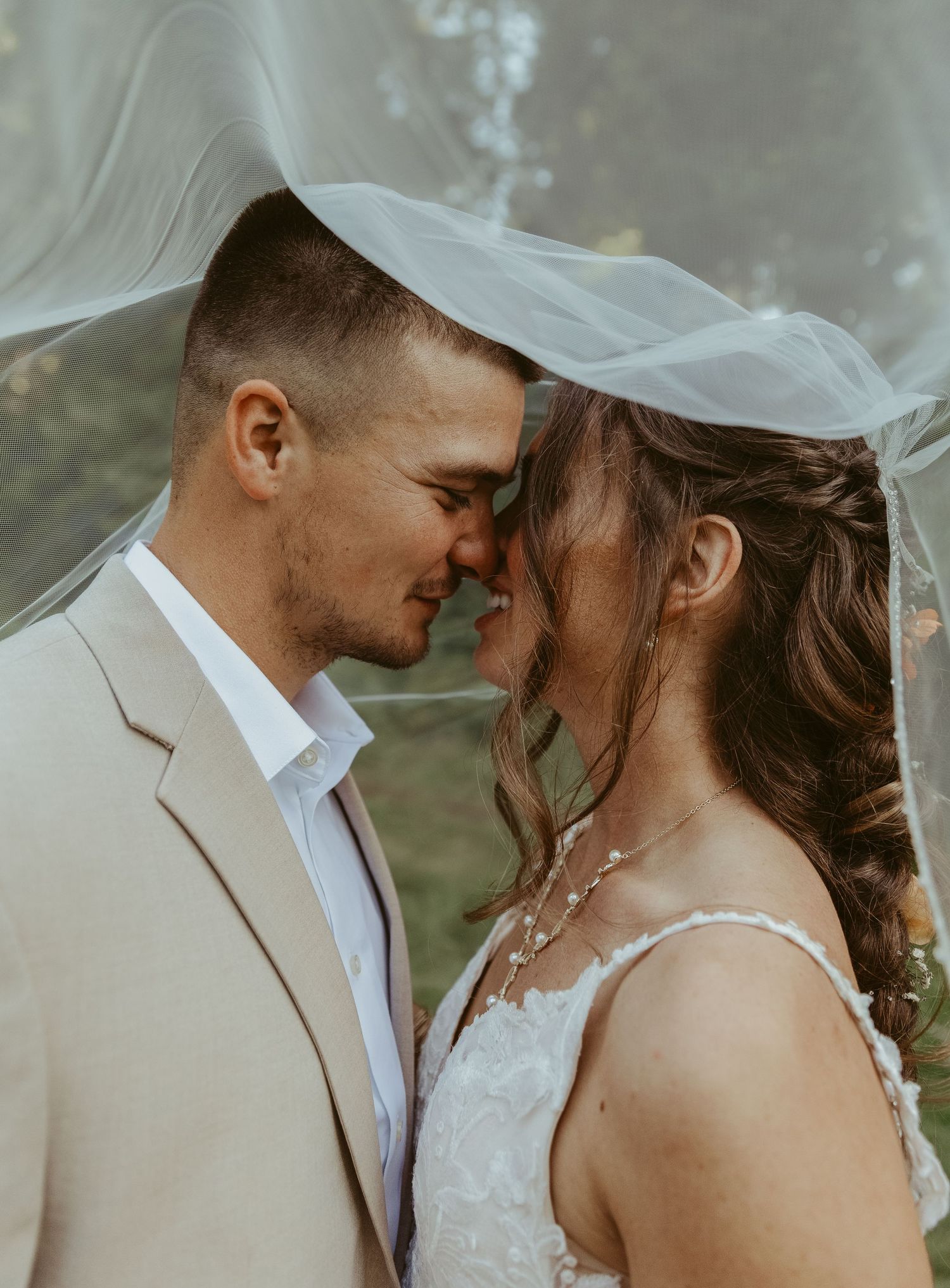 A romantic wedding couple shares intimate moments in a series of close-up shots with soft lighting and dreamy atmosphere.