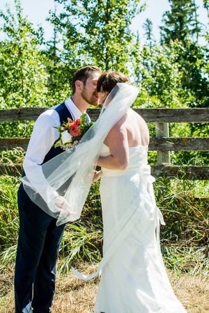 Romantic wedding photo sequence by rustic wooden fence in sunlit garden setting.