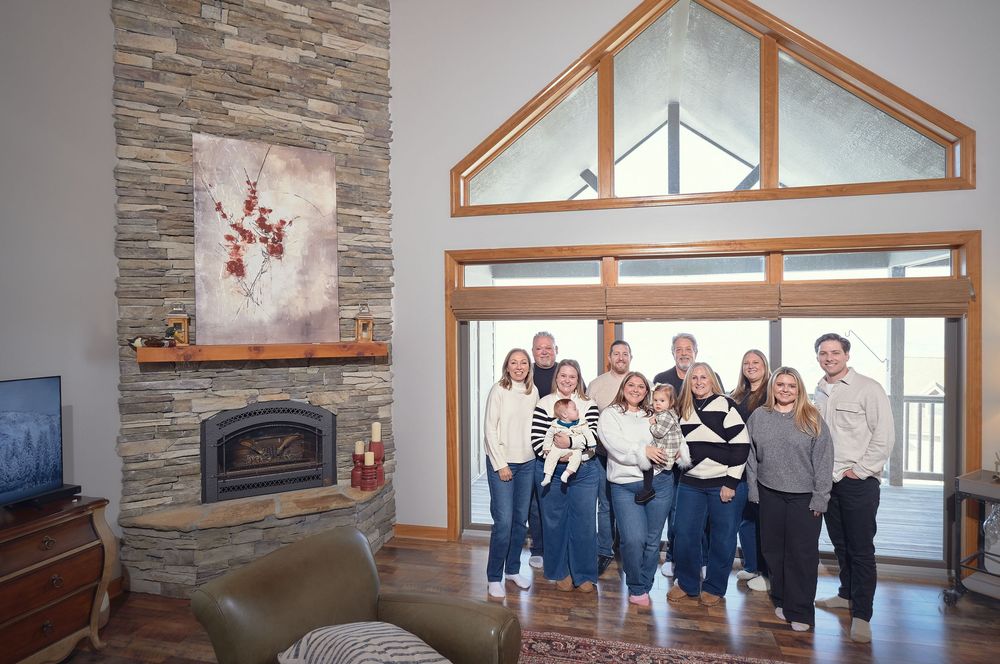 A sequence of interior photos showing a modern room with stone walls, large windows, and wooden trim details.