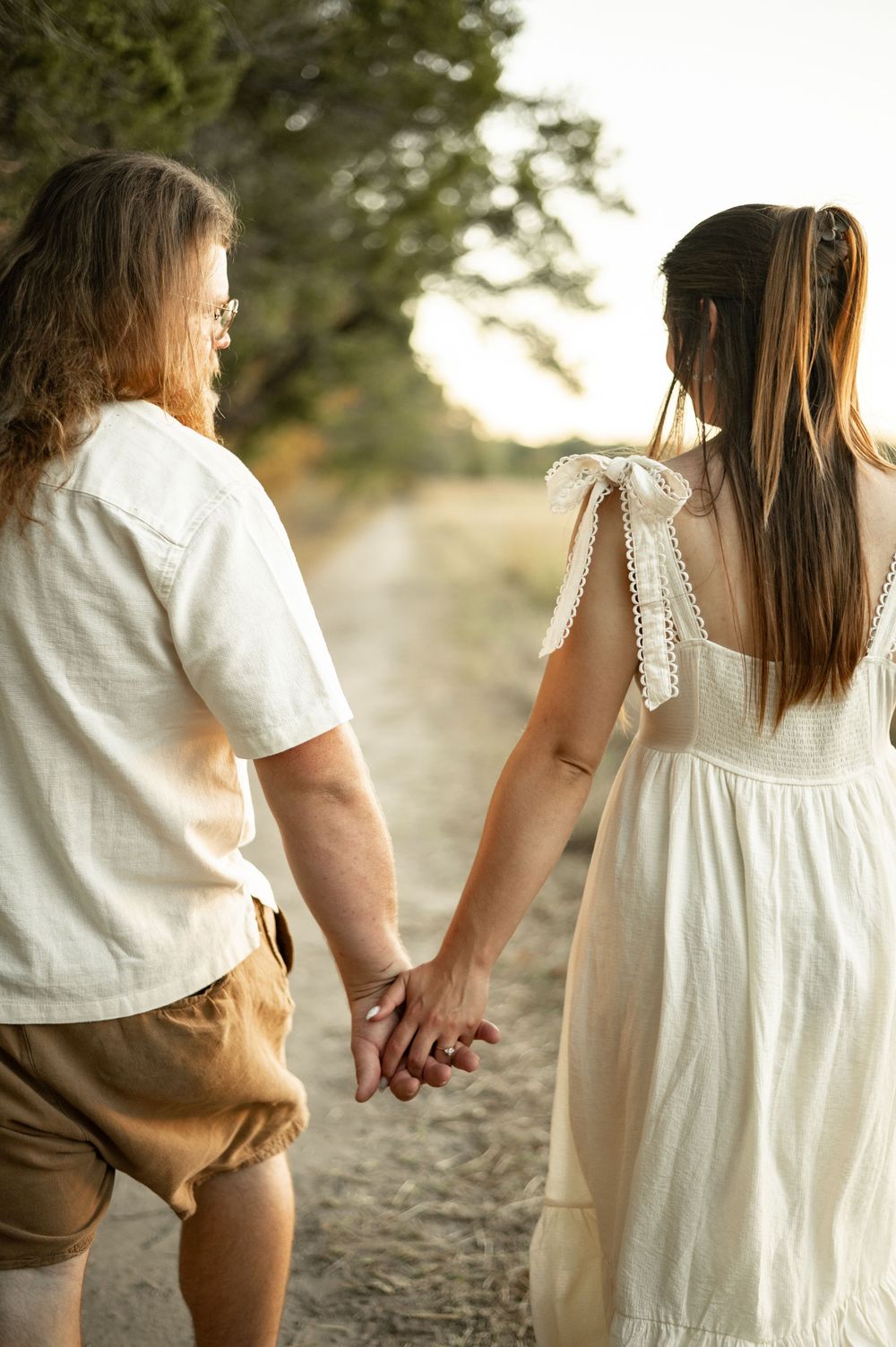 A series of photos showing people holding hands while walking together in a natural outdoor setting.