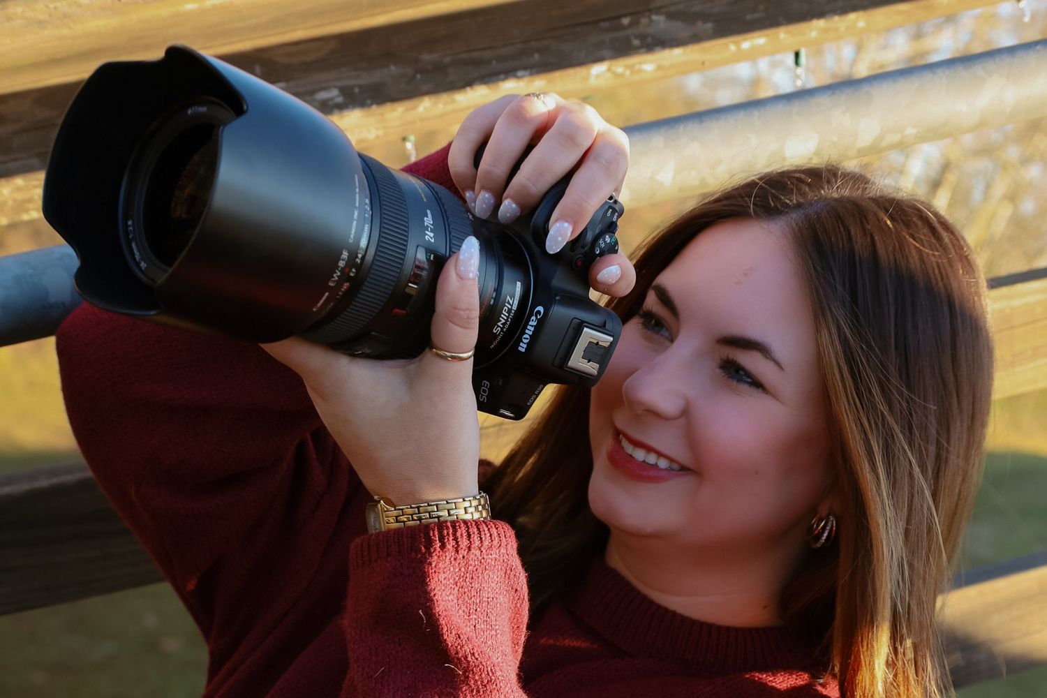 A photography session featuring camera equipment and outdoor lighting.