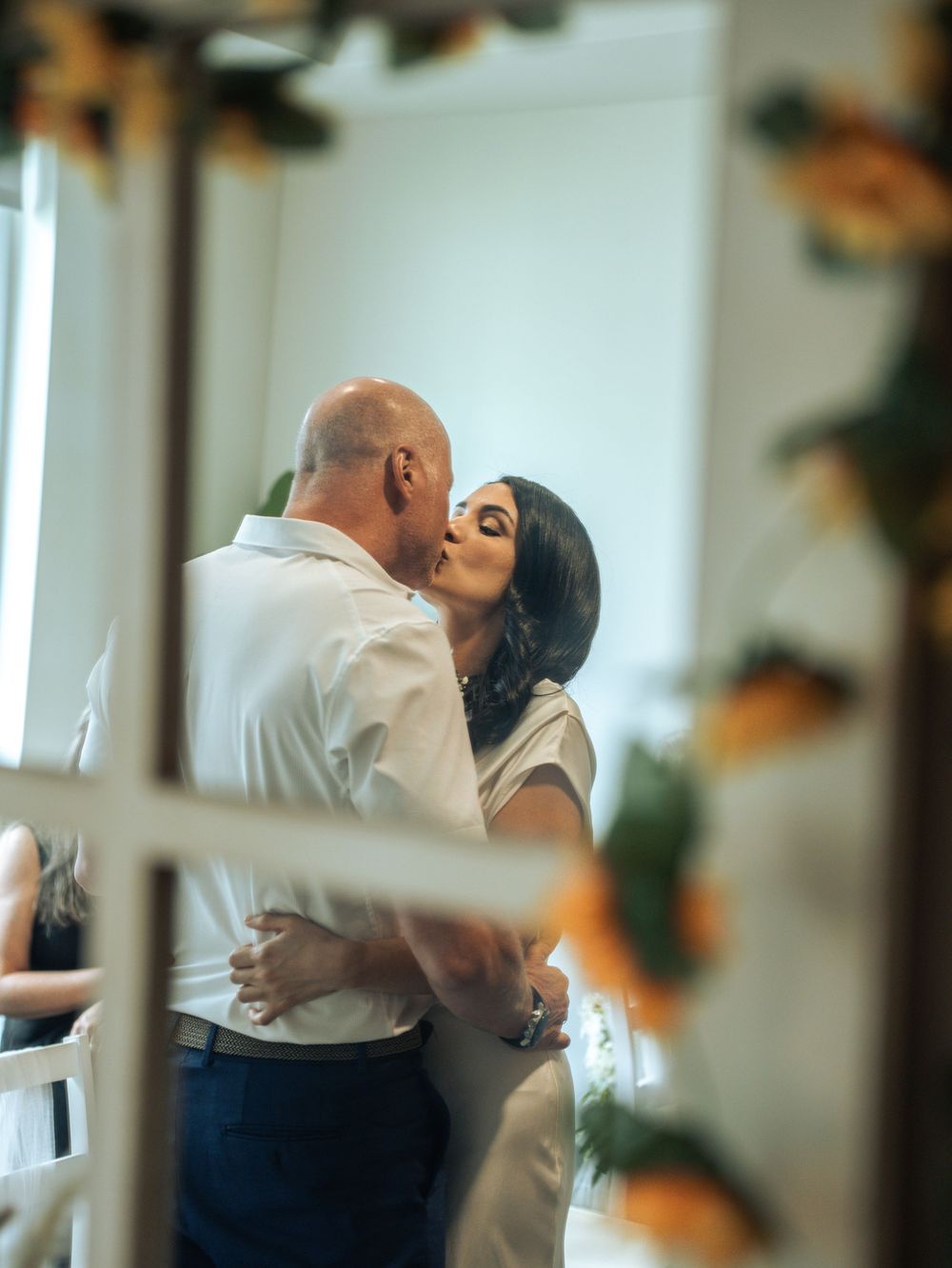 A sequence of romantic dance moves captured through decorative frames in an indoor setting in Naples, Florida