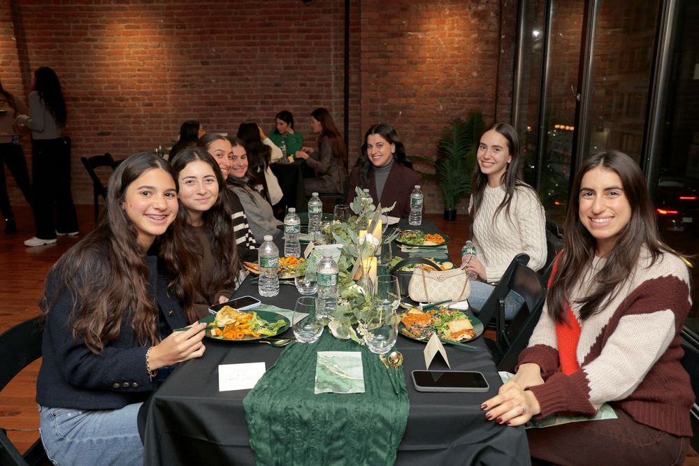 Young professionals networking at Propel Junior Board NYC launch—captured by Michelle Baum Photography.