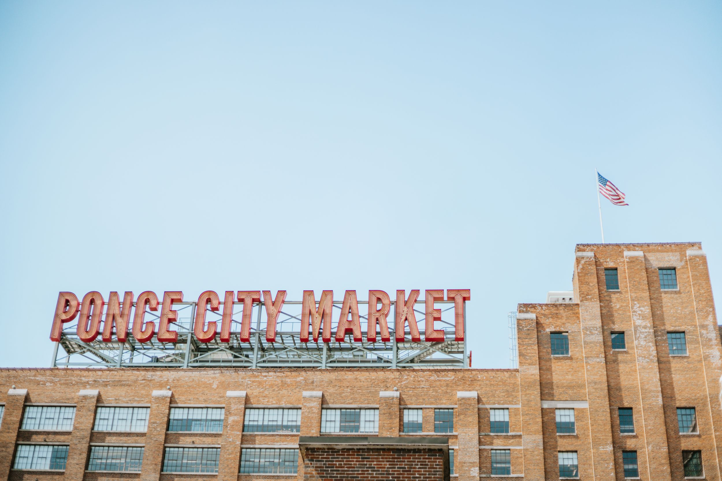 Historic Ponce City Market building exterior with vintage signage in Atlanta.
