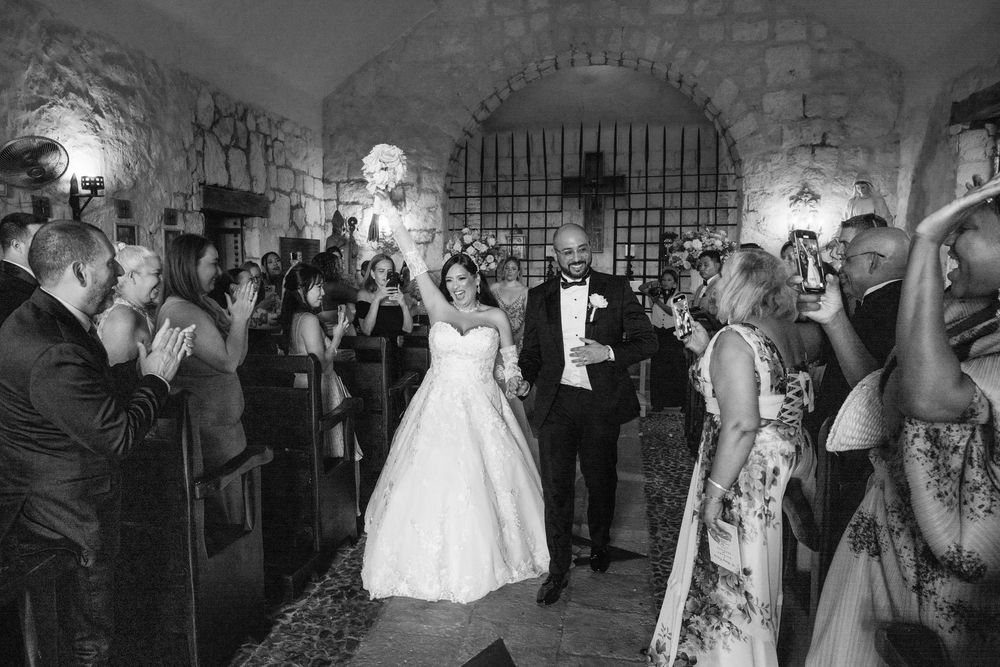 Black and white photos show wedding reception moments with dancing, dining and celebrating at an elegant venue.
