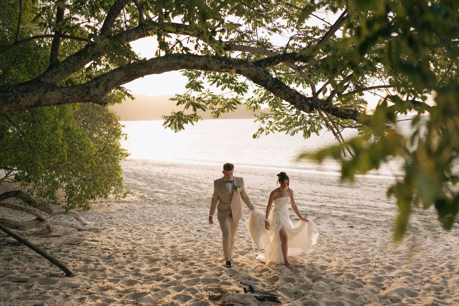 bride and groom sunset beach portraits in Westin Guanacaste