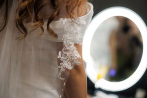 detailed photo of dress on bride