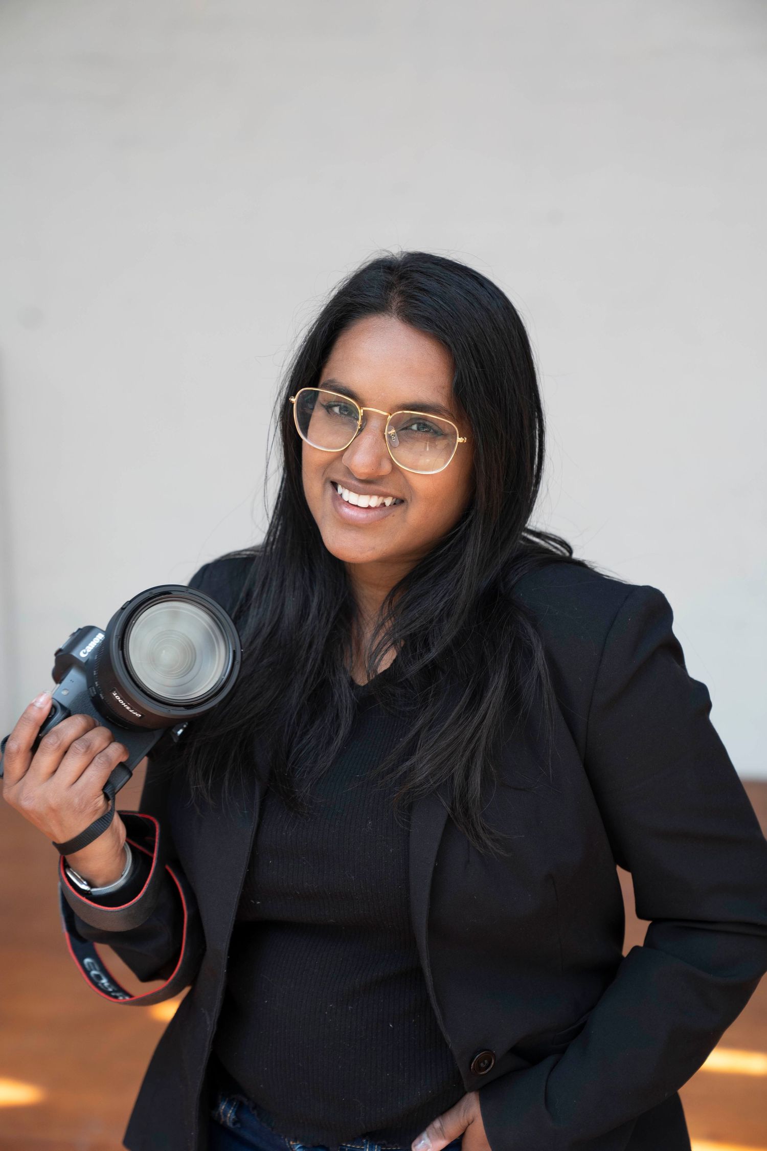 Founder of Heart Cove Films, Christina Tainsh is candidly posing for proffessional portraits by @ambersocials,