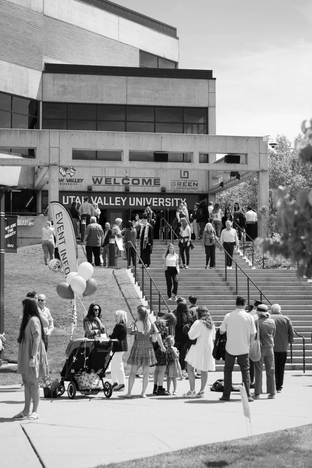 Students gather on steps outside Valley University entrance during welcome event.
