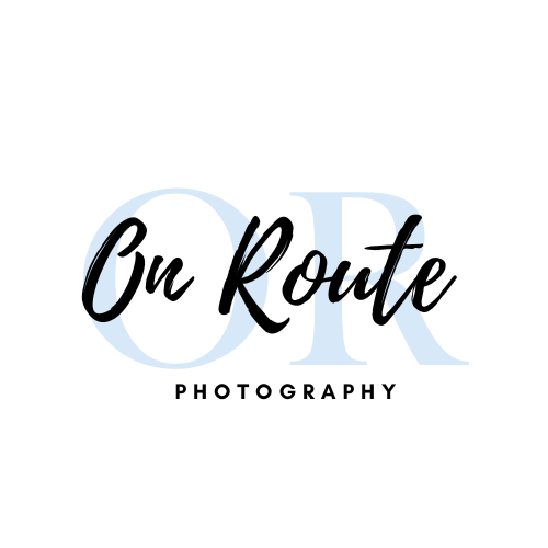 Blue and black elegant logo design for On Route Photography with stylized text.