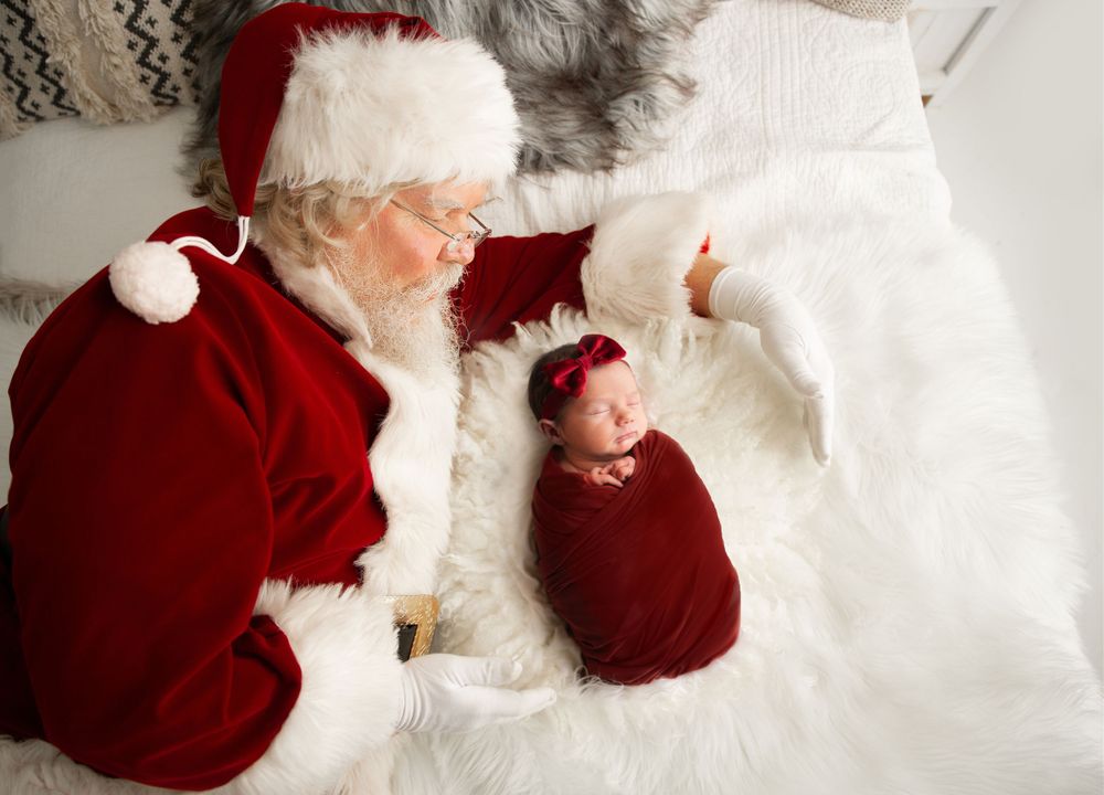 Newborn Photography for Christmas baby. Indoor session. Digital Santa background image. Southeast Michigan.