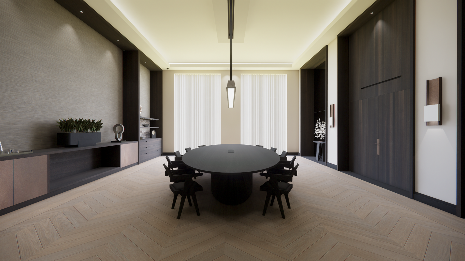 Sophisticated meeting room with round black table and modern pendant light fixture.