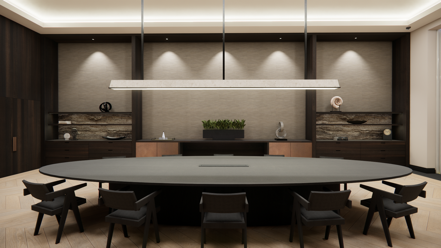 Elegant meeting space featuring dark wood accents and contemporary pendant lighting above oval conference table.