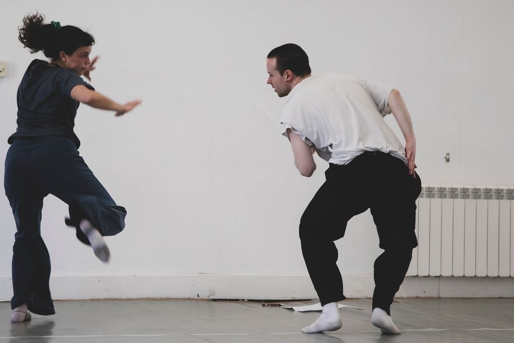 A sequence of five photos showing a person in black clothing performing a martial arts jumping kick movement.