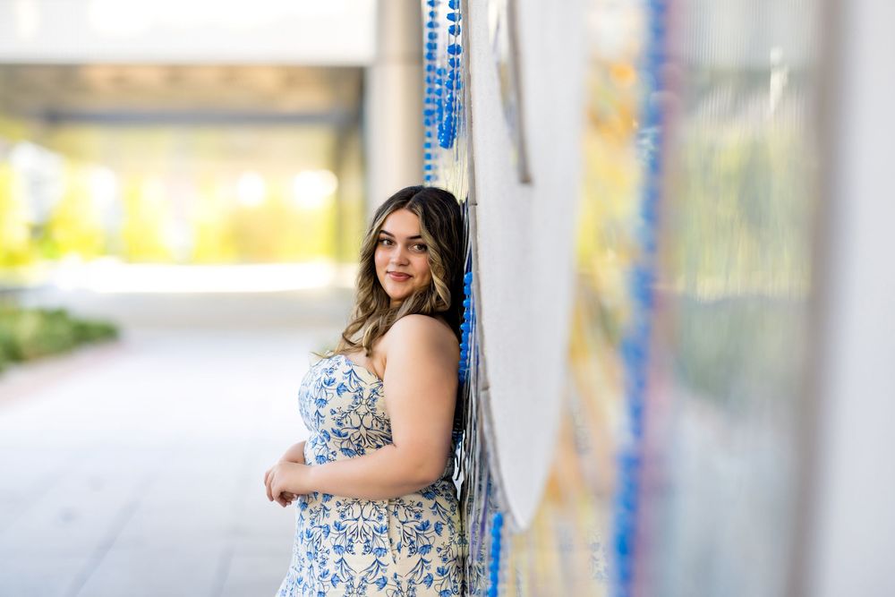 A blue and white floral dress photographed in a bright outdoor setting. Photos by Tampa Photographer DigitalMyst Photography
