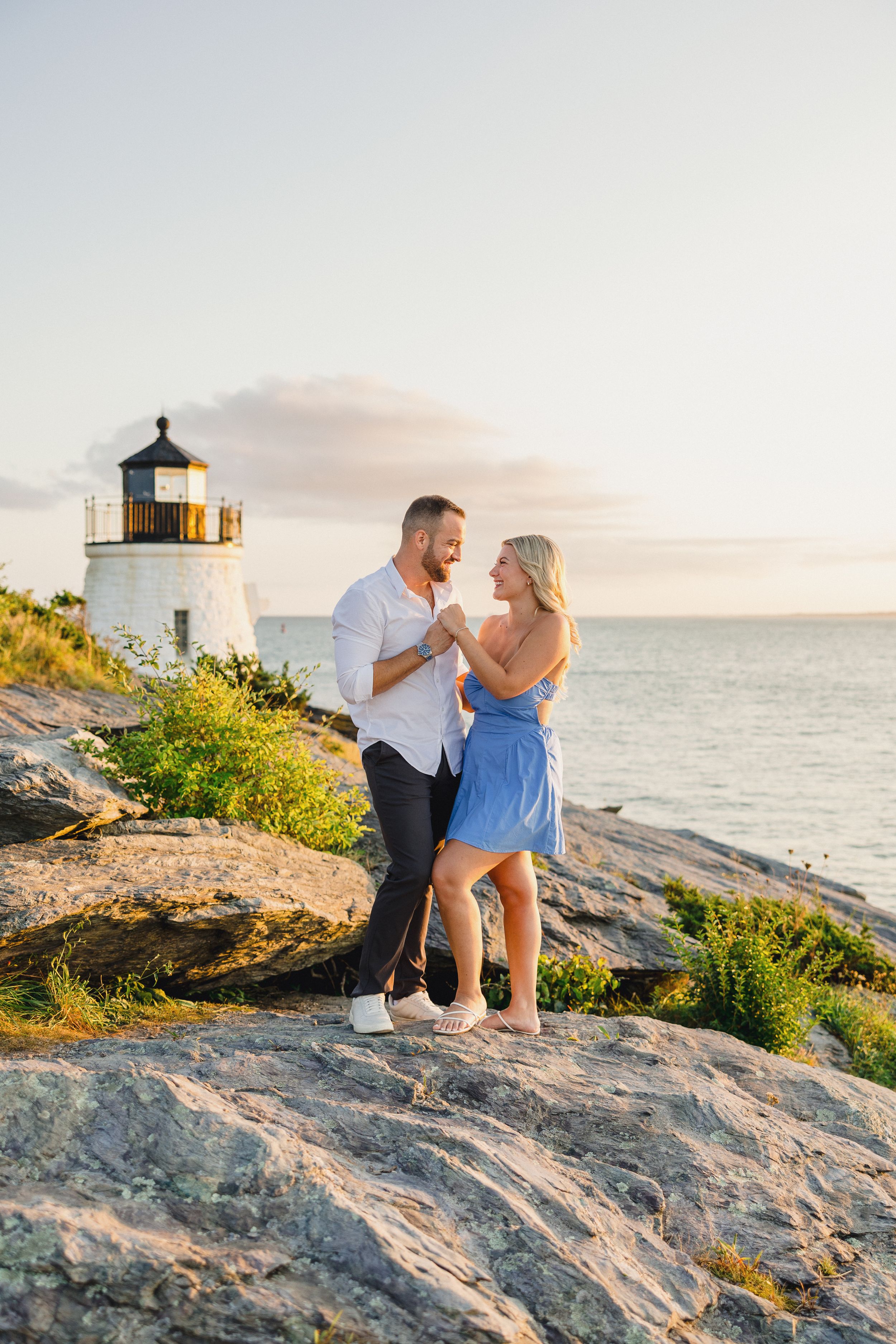 RI engagement photographer, Newport engagement photos, Wedding photographers, lighthouse during golden hour. Castle Hill, Newport, RI