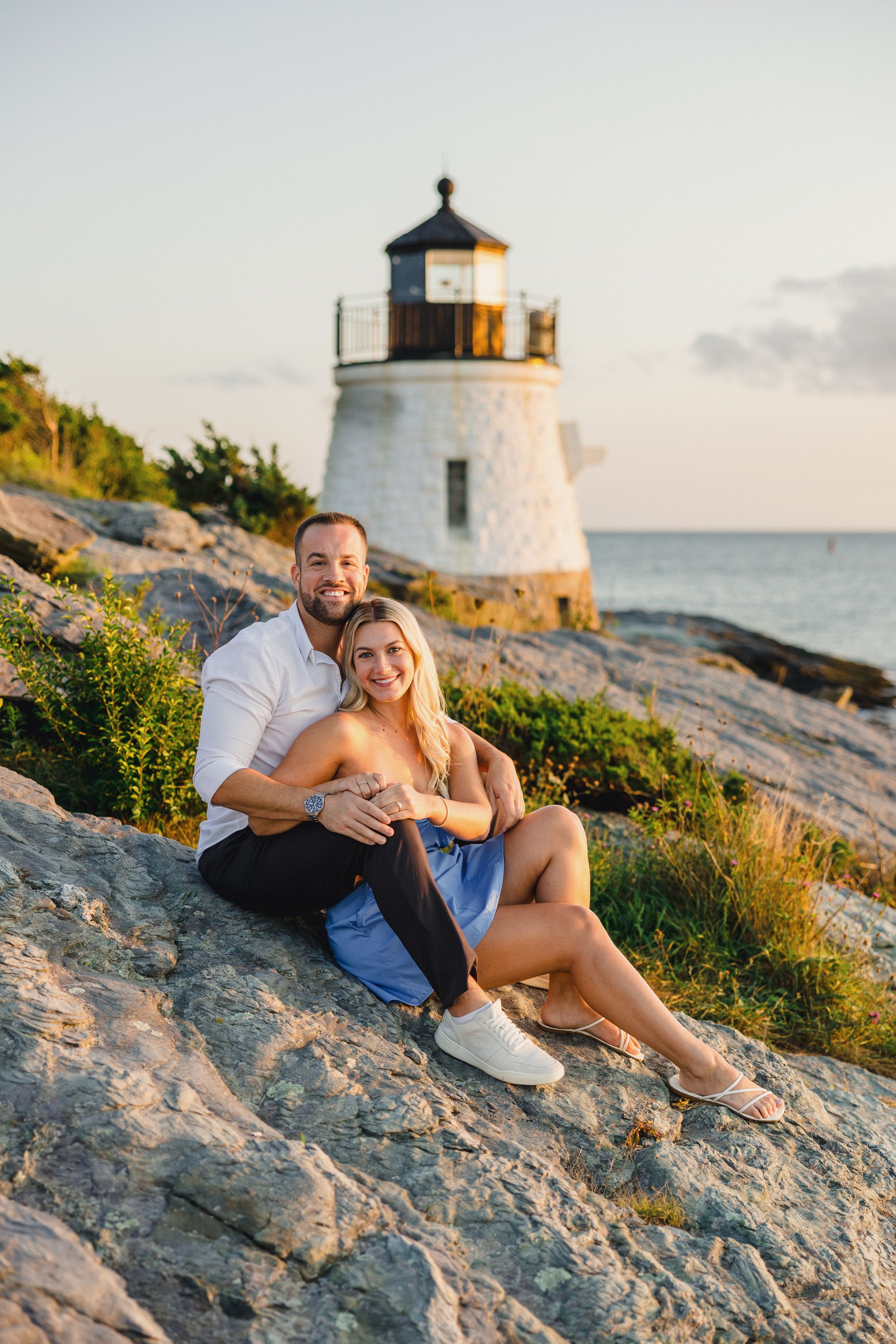 RI engagement photographer, Newport engagement photos, Wedding photographers, lighthouse in background at sunset. Castle Hill, Newport, RI