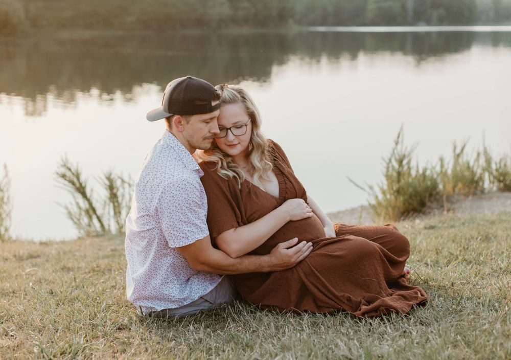 Intimate family moments captured at sunset by the waterfront.