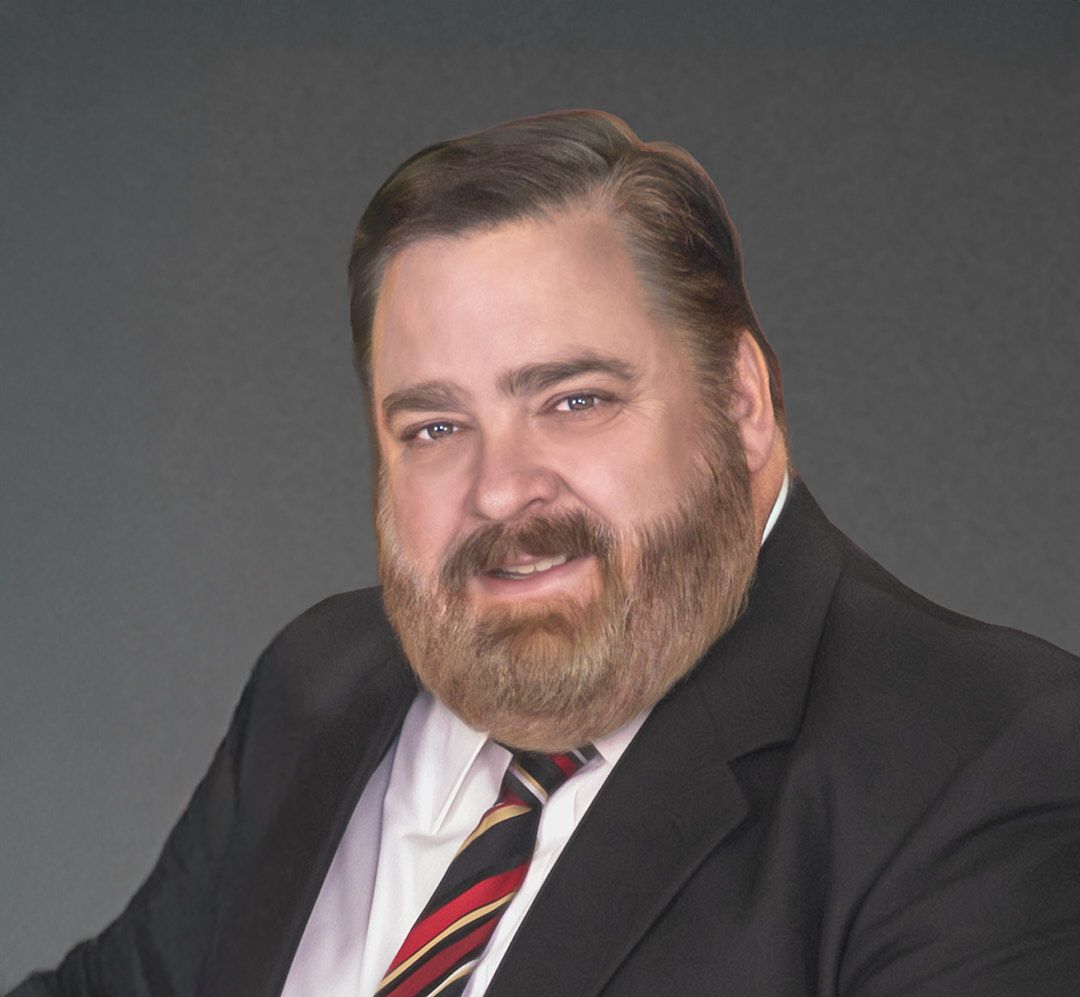 Headshot of middle-aged man with beard