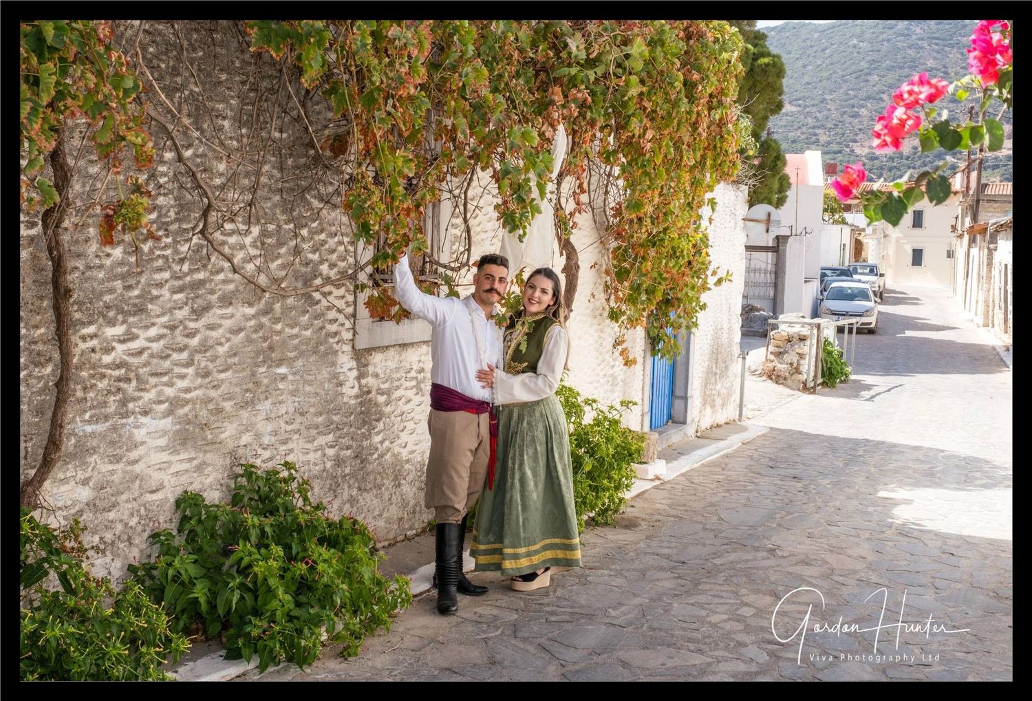 Bride and Groom in traditiona Greek Dress in a traditional Cretan village.