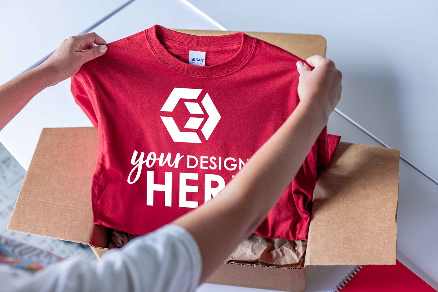 custom t-shirt coming out of a box