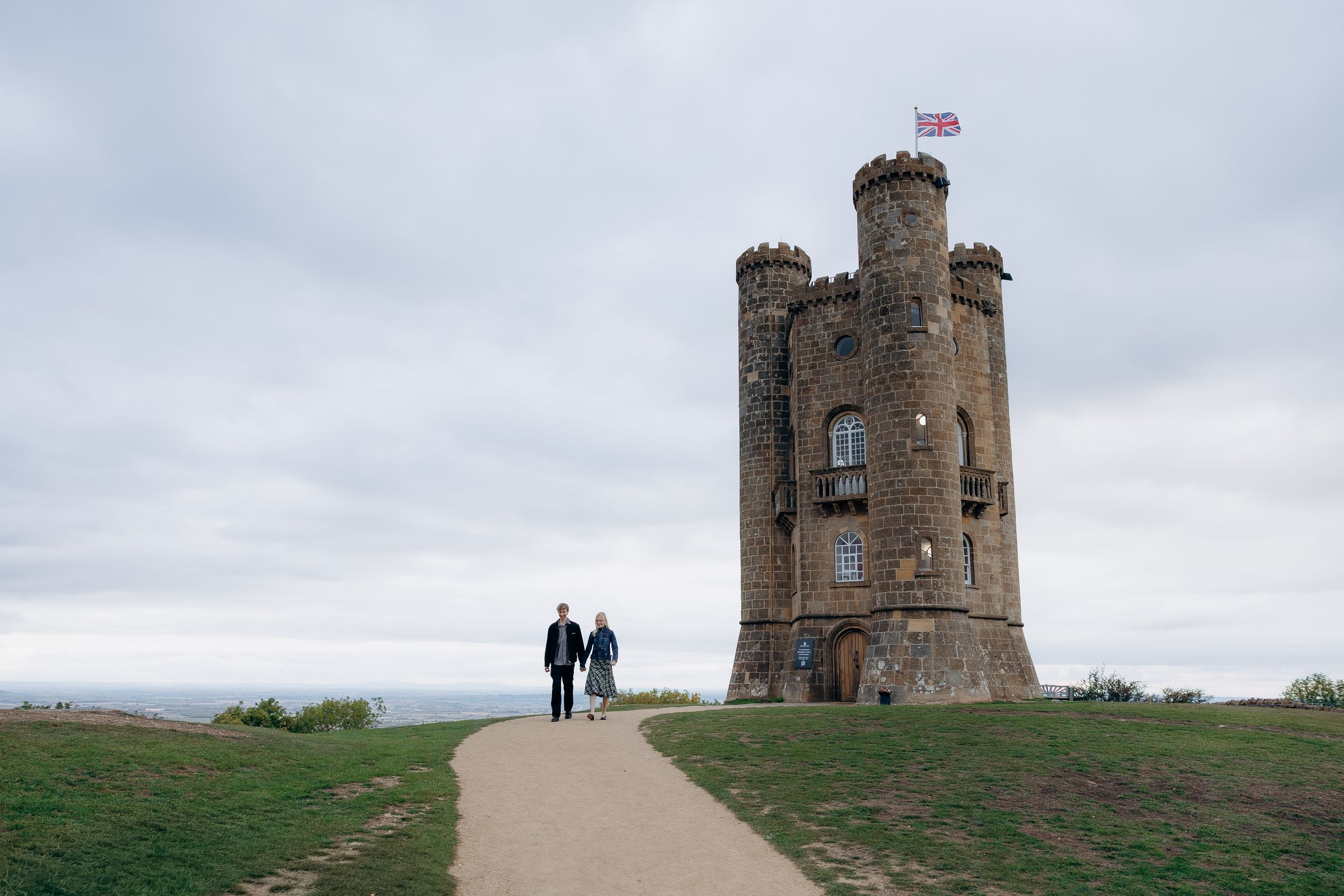 Newly engaged couple at Broadway Tower.