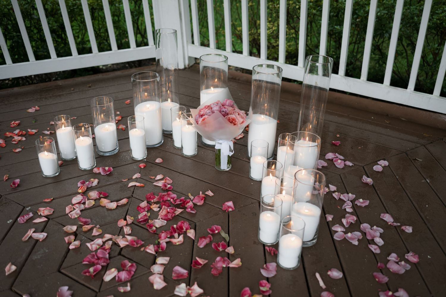 Flower petals scattered beneath the gazebo for a romantic Houston proposal