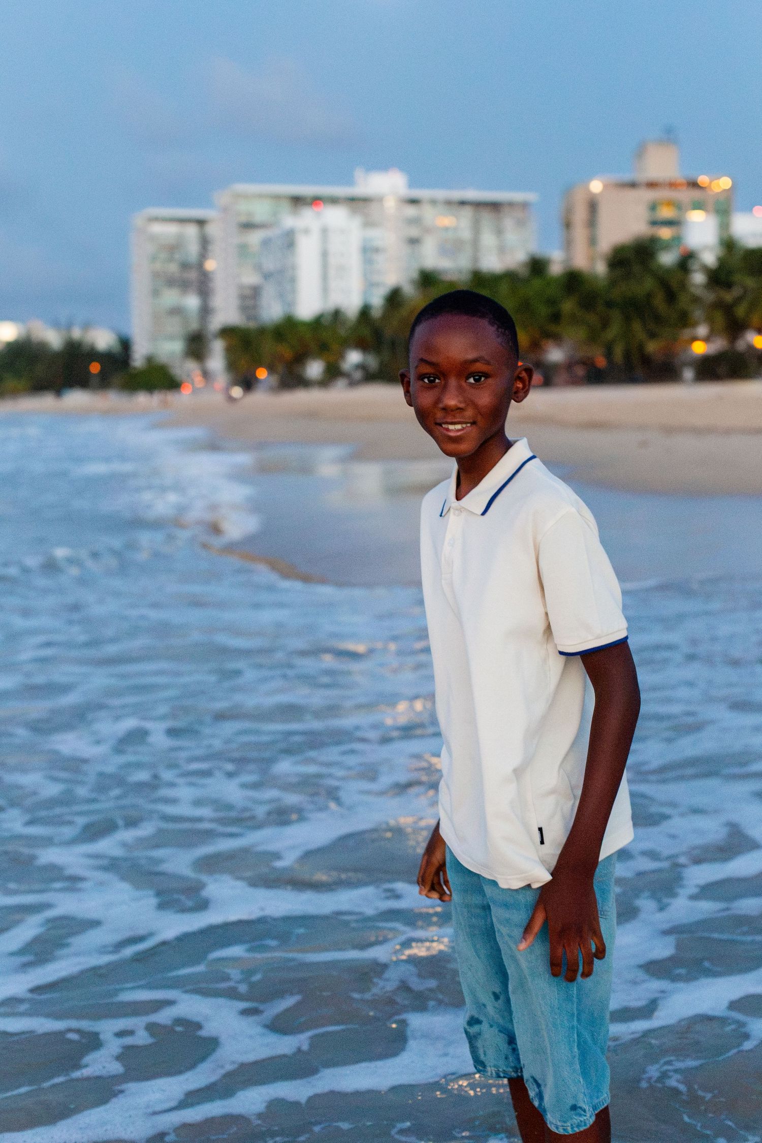 Portrait of a boy on the beach in Isla Verde, Carolina, Puerto Rico.