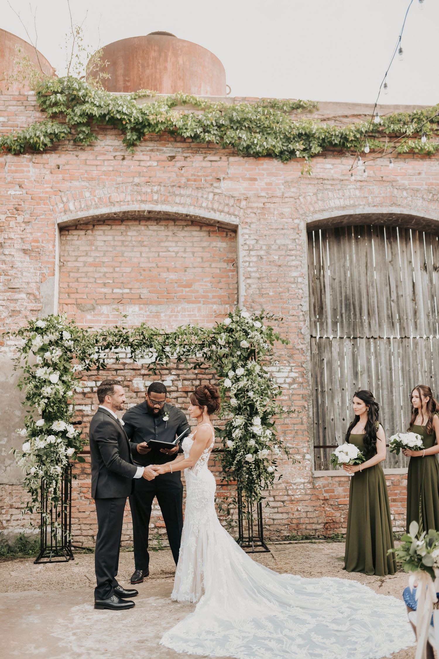Newlyweds celebrating after their Cotton Mill wedding ceremony