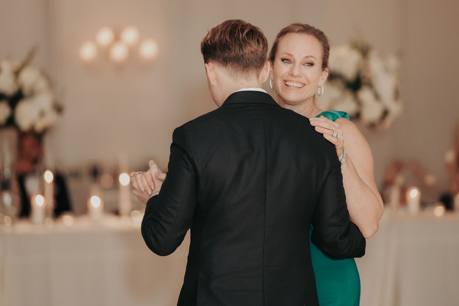 Payton dancing with his mom during the wedding reception