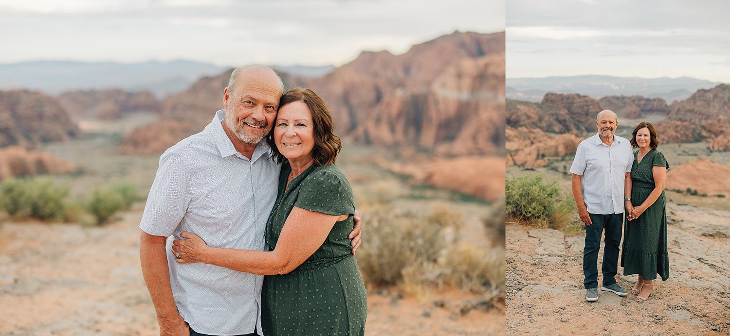 Couple embracing and posing together outdoors with stunning red rock canyon landscape in the background.