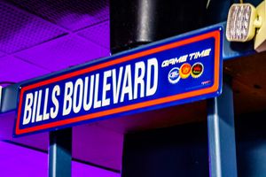 Bills Boulevard Game Time street sign displayed indoors with blue and orange colors at a Buffalo Bills themed venue.
