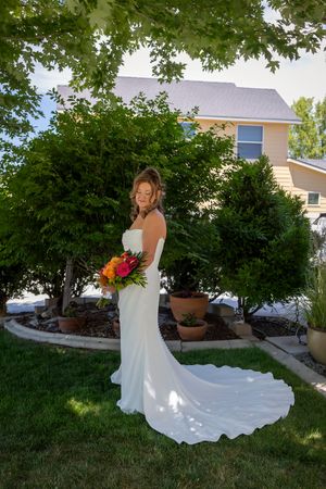 bridal portrait with tropical flower bouquet backyard wedding Boise Idaho Milestones Portraits