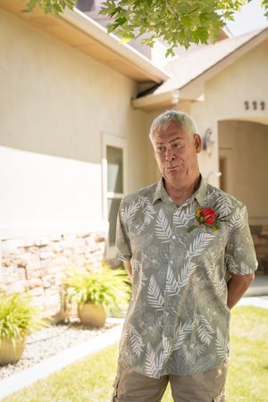 Groom expression at first look backyard wedding Boise Idaho Milestones Portraits