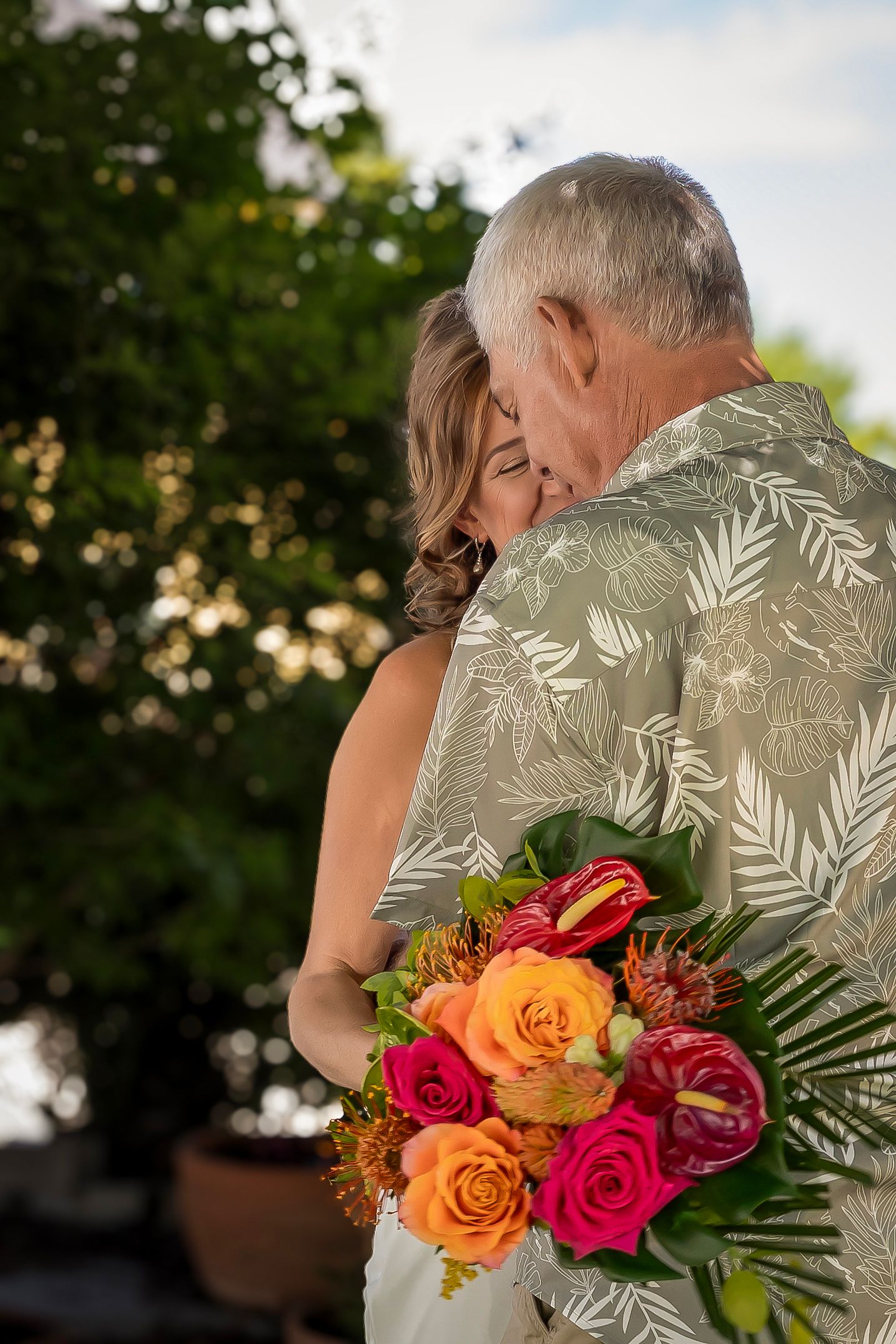 bride and groom embrace backyard wedding Boise Idaho Milestones Portraits