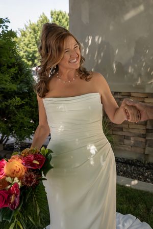 happy bride backyard wedding Boise Idaho Milestones Portraits