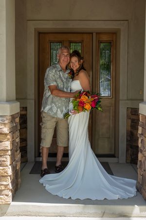 bride and groom portrait on doorstep backyard wedding Boise Idaho Milestones Portraits