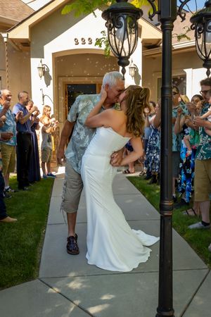 getaway kiss backyard wedding Boise Idaho Milestones Portraits