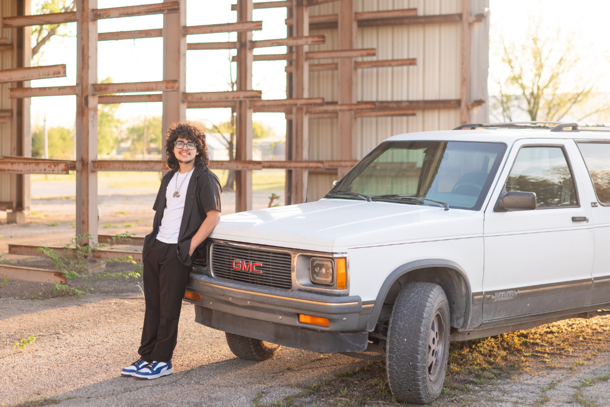 Senior Guy with His Car and Guitar in Downtown Bartlesville by Bartlesville Senior Photographer Kristi Bray