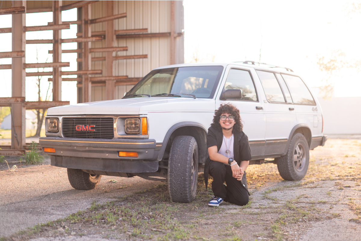 Senior Guy with His Car and Guitar in Downtown Bartlesville by Bartlesville Senior Photographer Kristi Bray