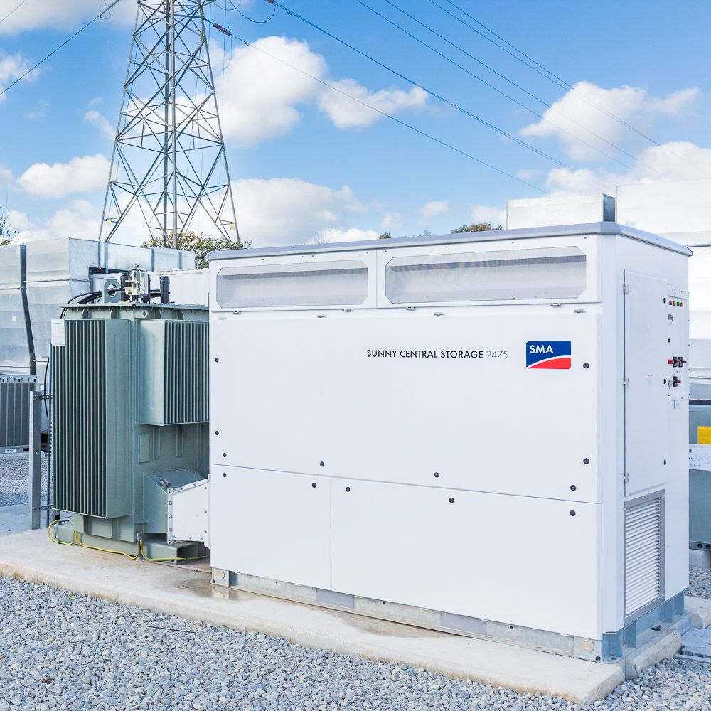 Battery storage units on power grid site